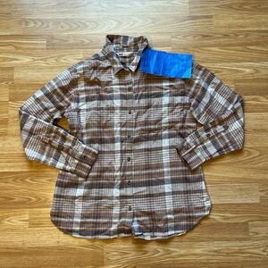 “SO Goods For Life” tan & grey plaid button-up shirt with a 90s vibe